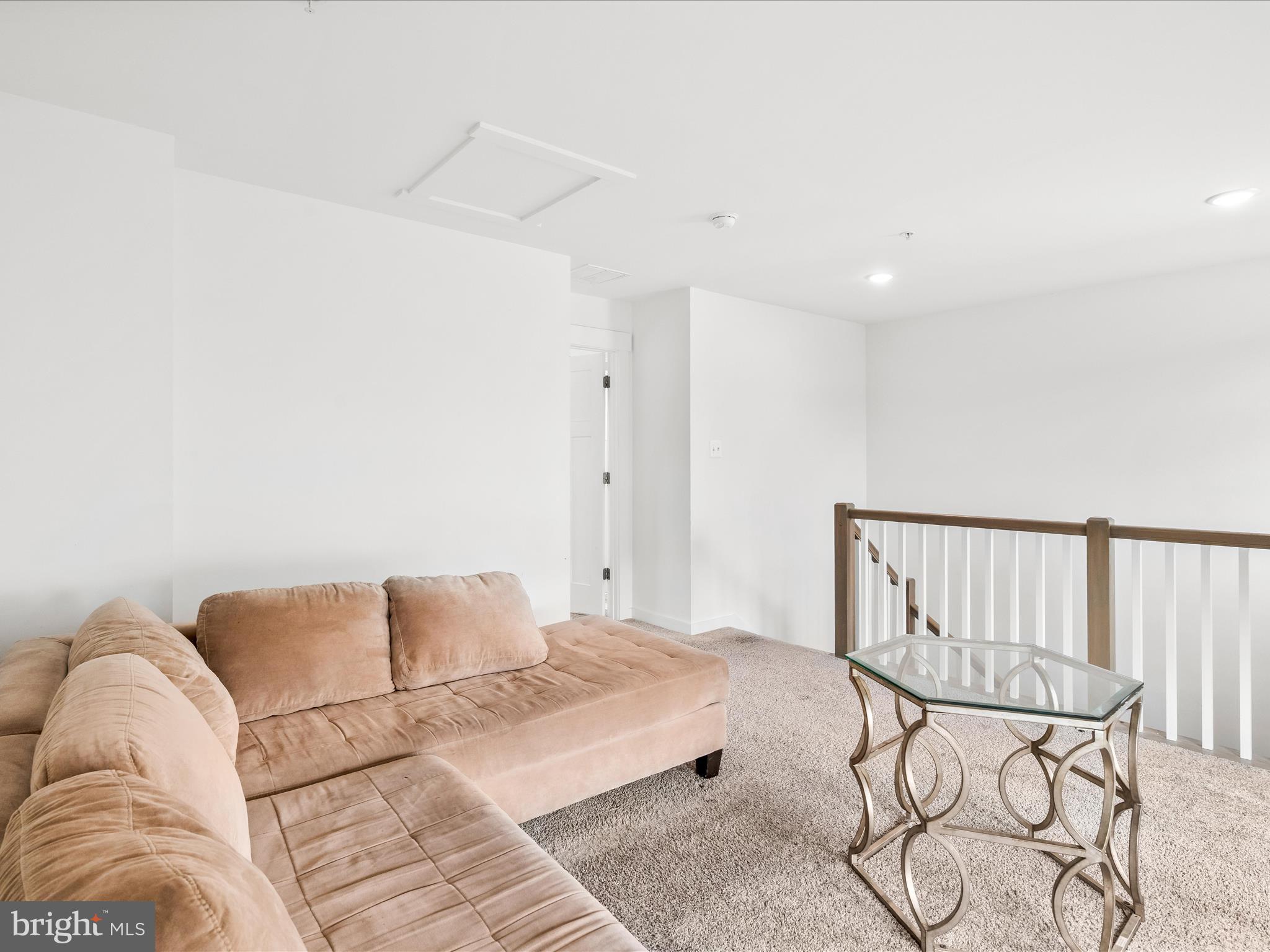 404 Waverley Drive Frederick, MD 21702 - Photo 20 of 28 a living room with a couch