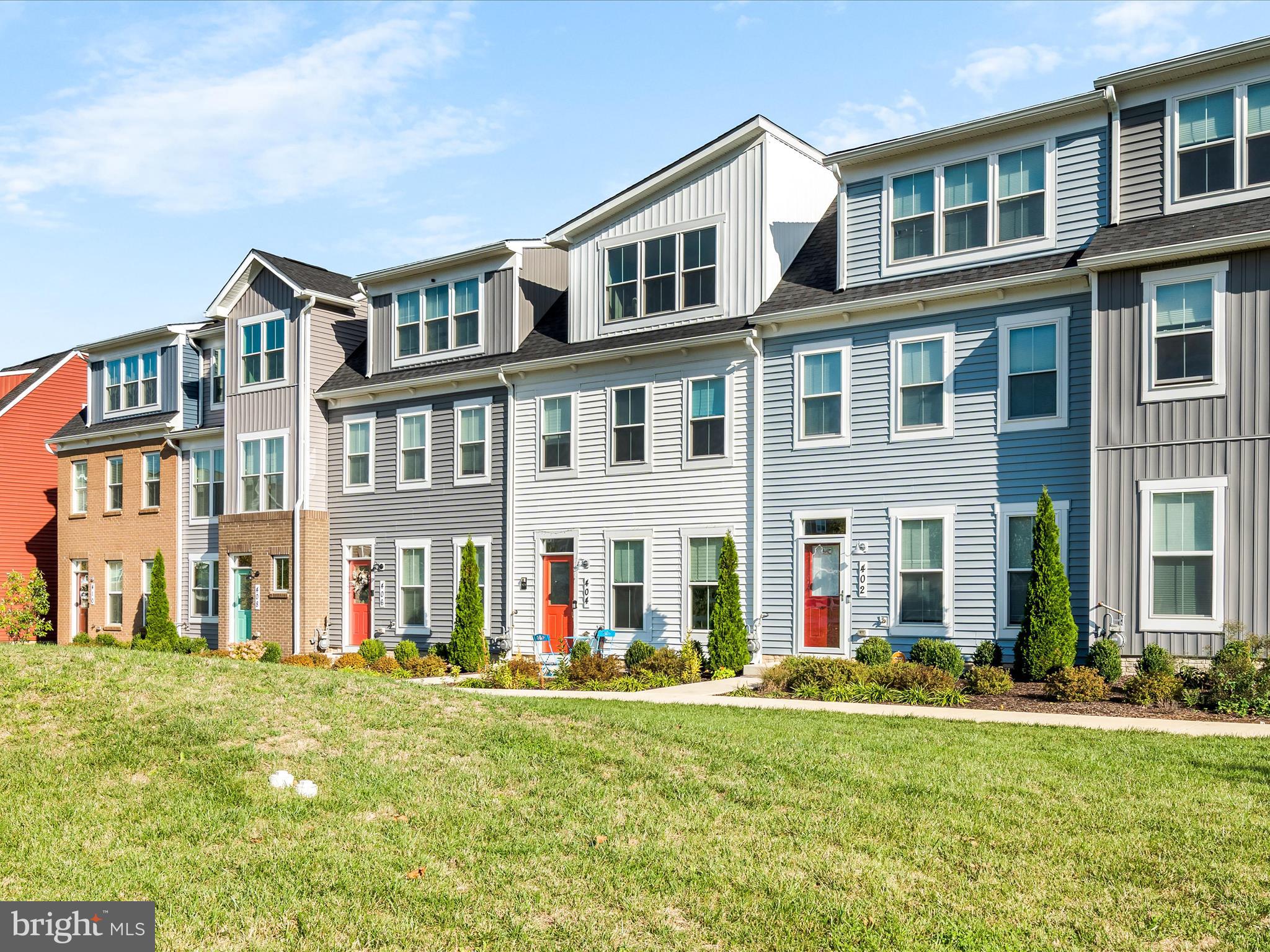 404 Waverley Drive Frederick, MD 21702 - Photo 2 of 28 a view of an apartment with a garden and plants