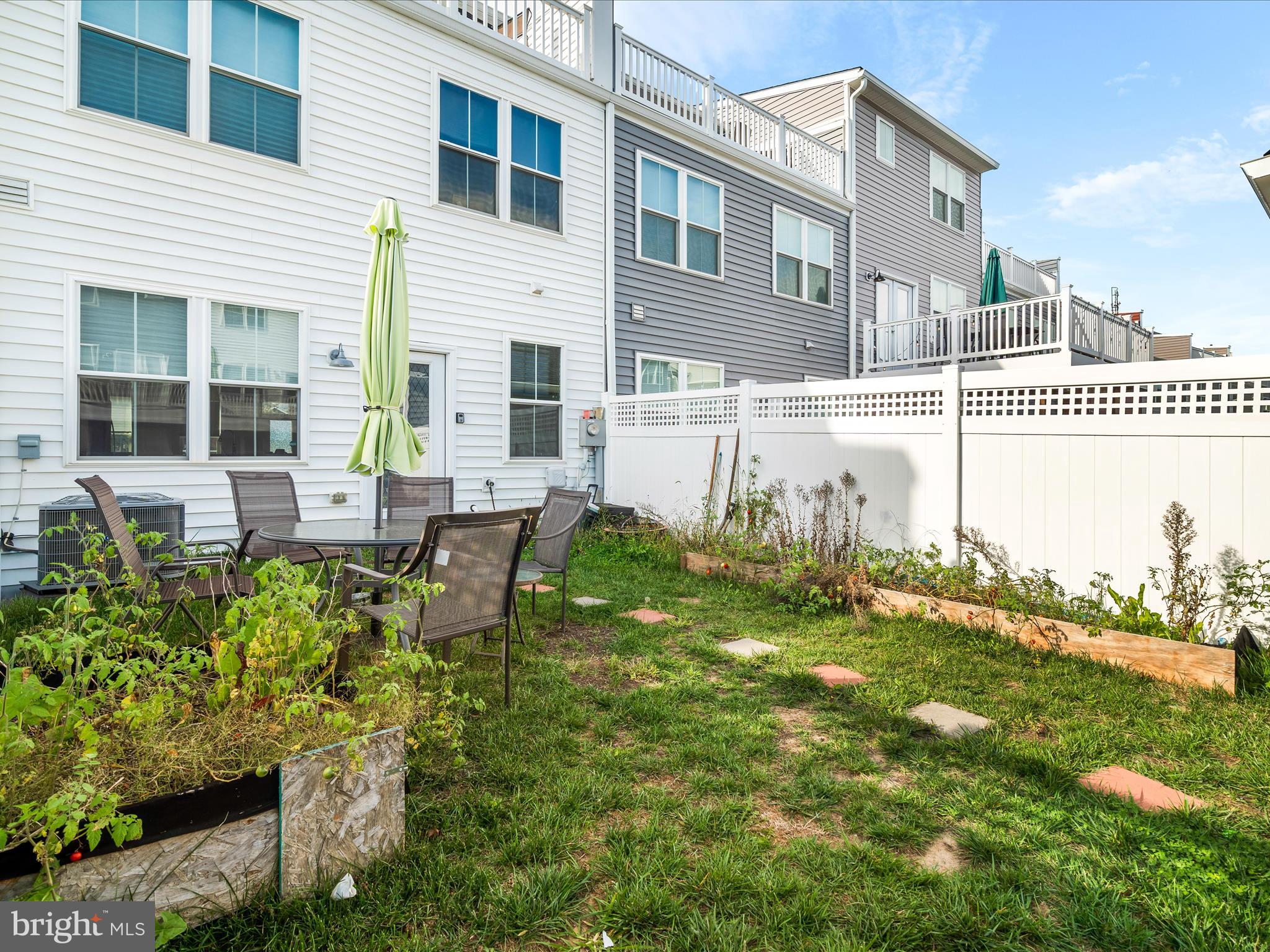 404 Waverley Drive Frederick, MD 21702 - Photo 27 of 28 a view of a house with backyard and sitting area