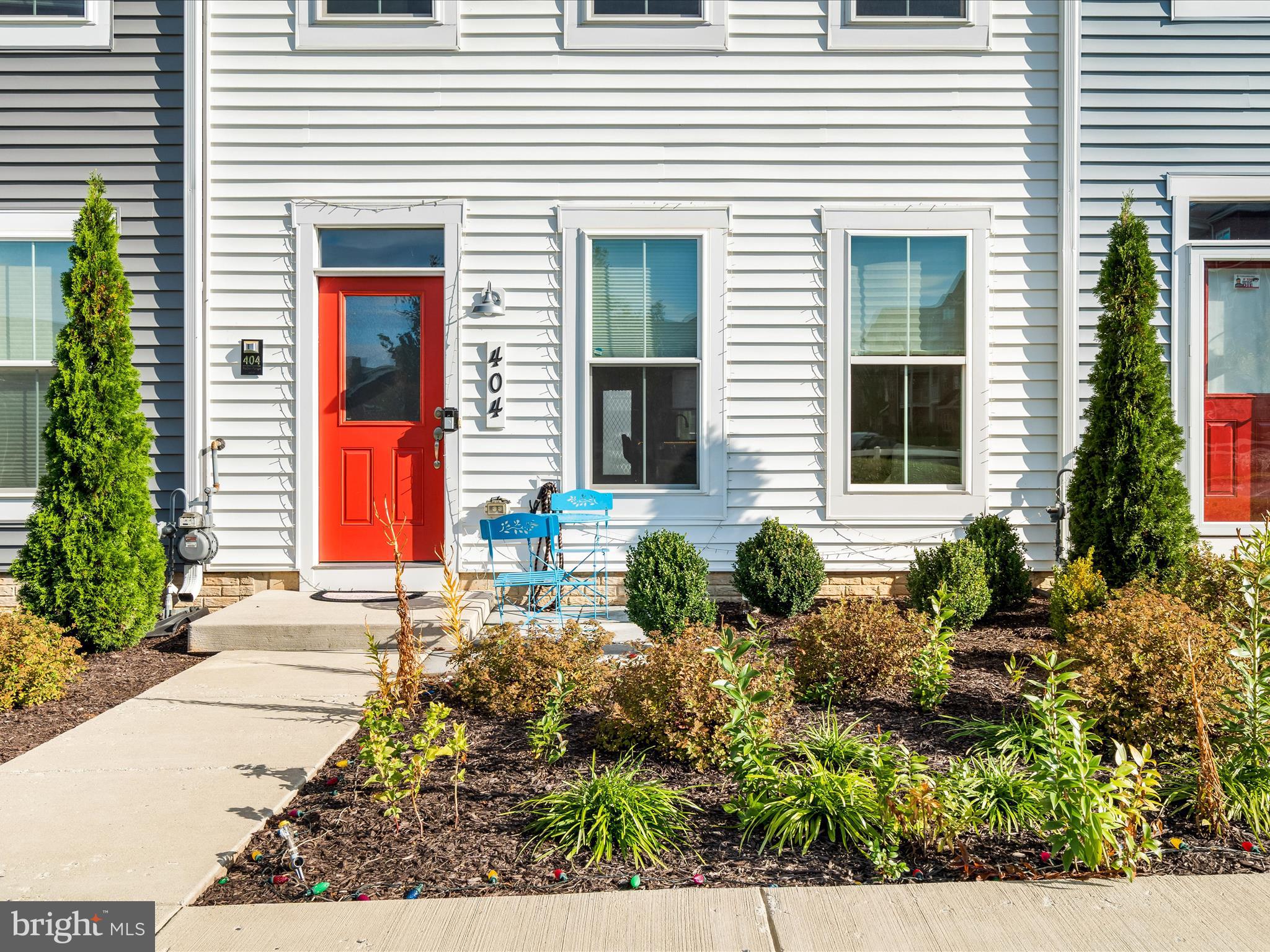 404 Waverley Drive Frederick, MD 21702 - Photo 4 of 28 a front view of a house with a yard