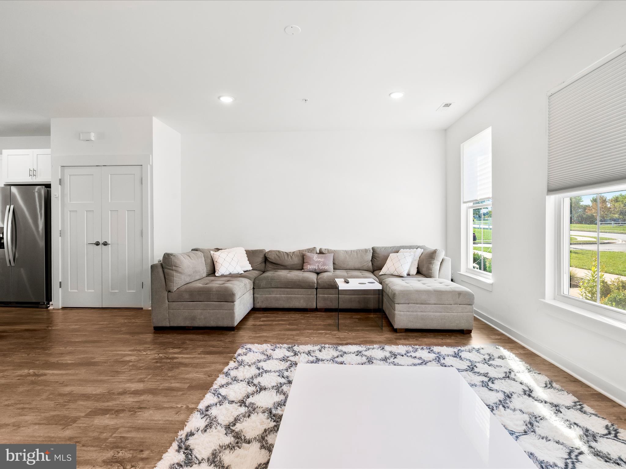 404 Waverley Drive Frederick, MD 21702 - Photo 6 of 28 a living room with furniture and a couch