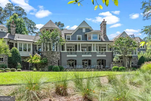 a view of a house with swimming pool
