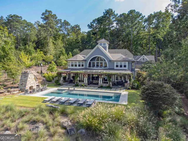 a front view of a house with swimming pool