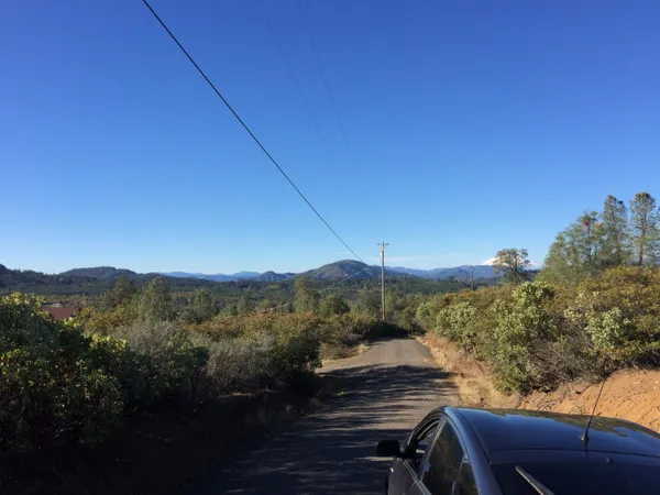 a view of a balcony with mountain view