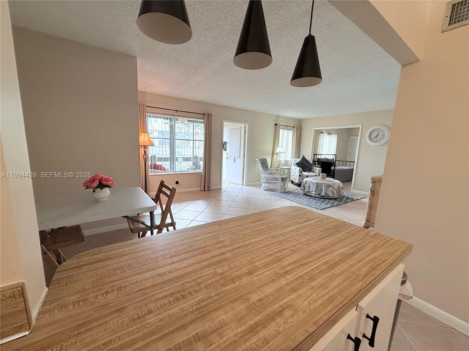 340 Pine Ridge Circle, Unit C1 Greenacres, FL 33463 - Photo 18 of 24 a living room with furniture