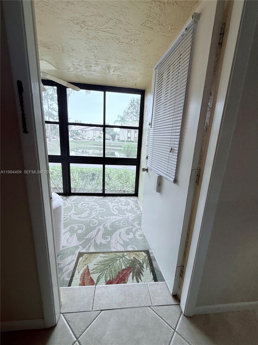 340 Pine Ridge Circle, Unit C1 Greenacres, FL 33463 - Photo 8 of 24 a view of entry way