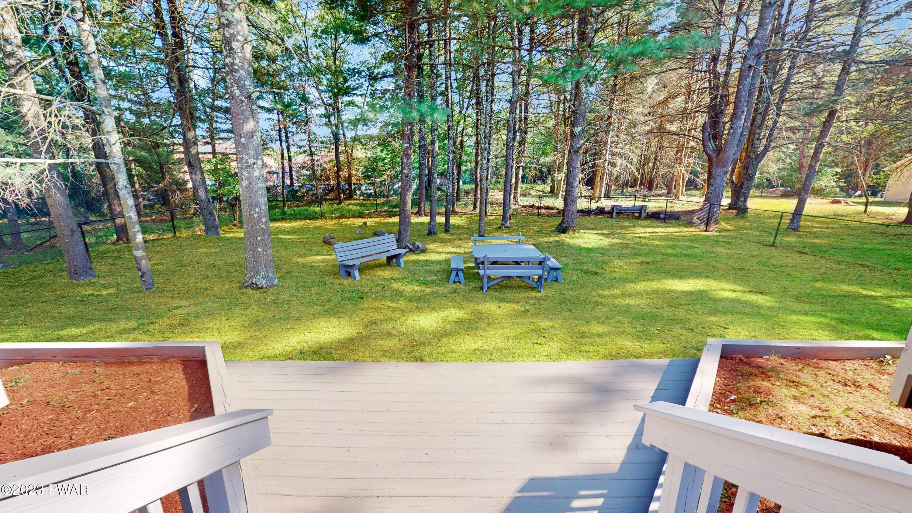 308 Rambling Way Milford, PA 18337 - Photo 4 of 70 Feature Photo: Lower Deck & Backyard