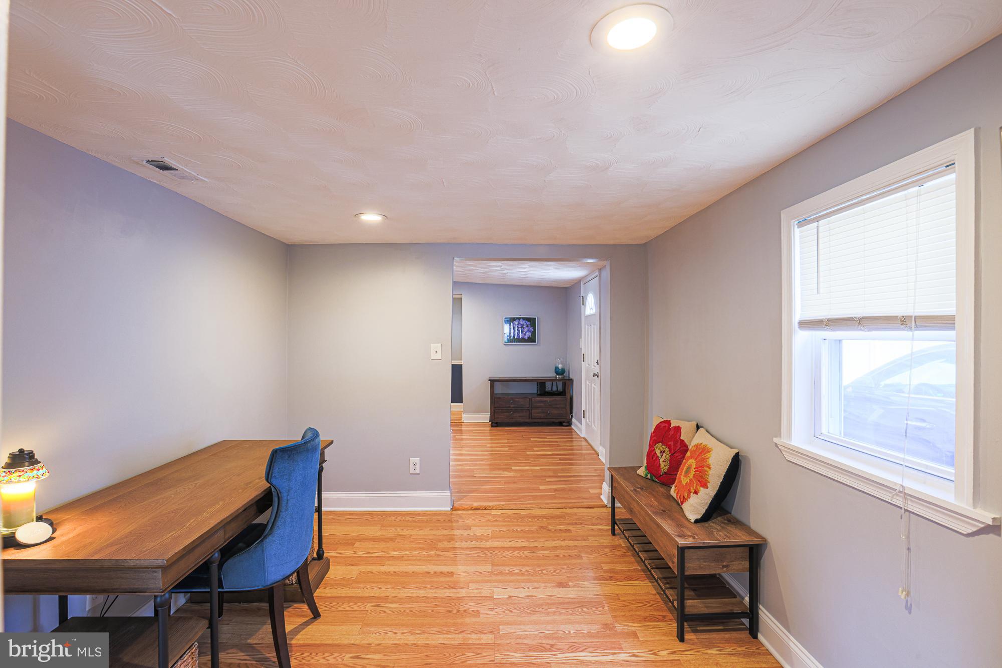 2519 Sycamore Avenue Baltimore, MD 21219 - Photo 13 of 30 a living room with furniture and a window