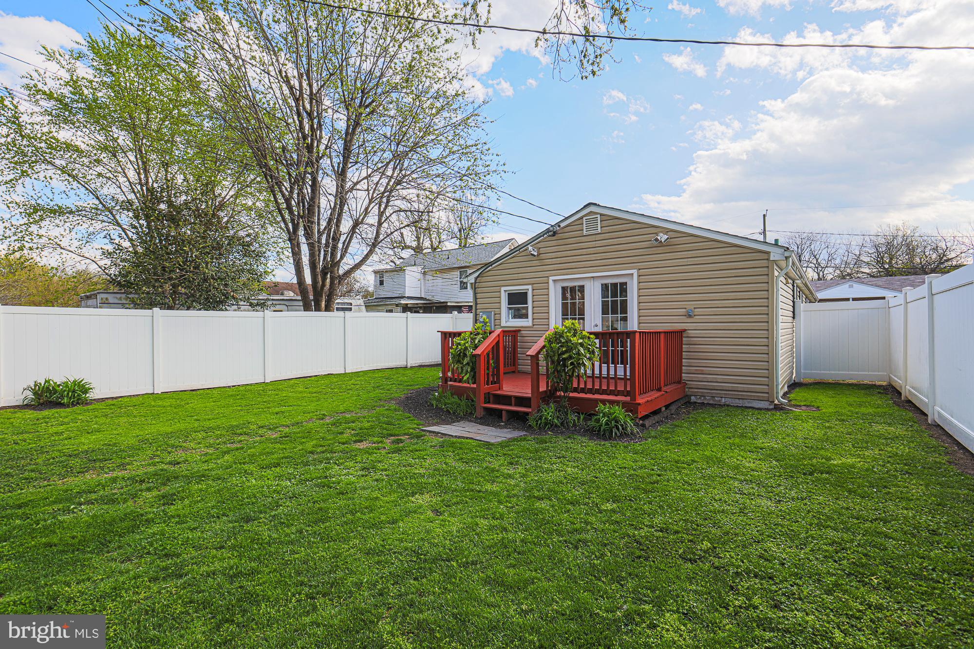 2519 Sycamore Avenue Baltimore, MD 21219 - Photo 25 of 30 a view of a house with a yard and sitting area