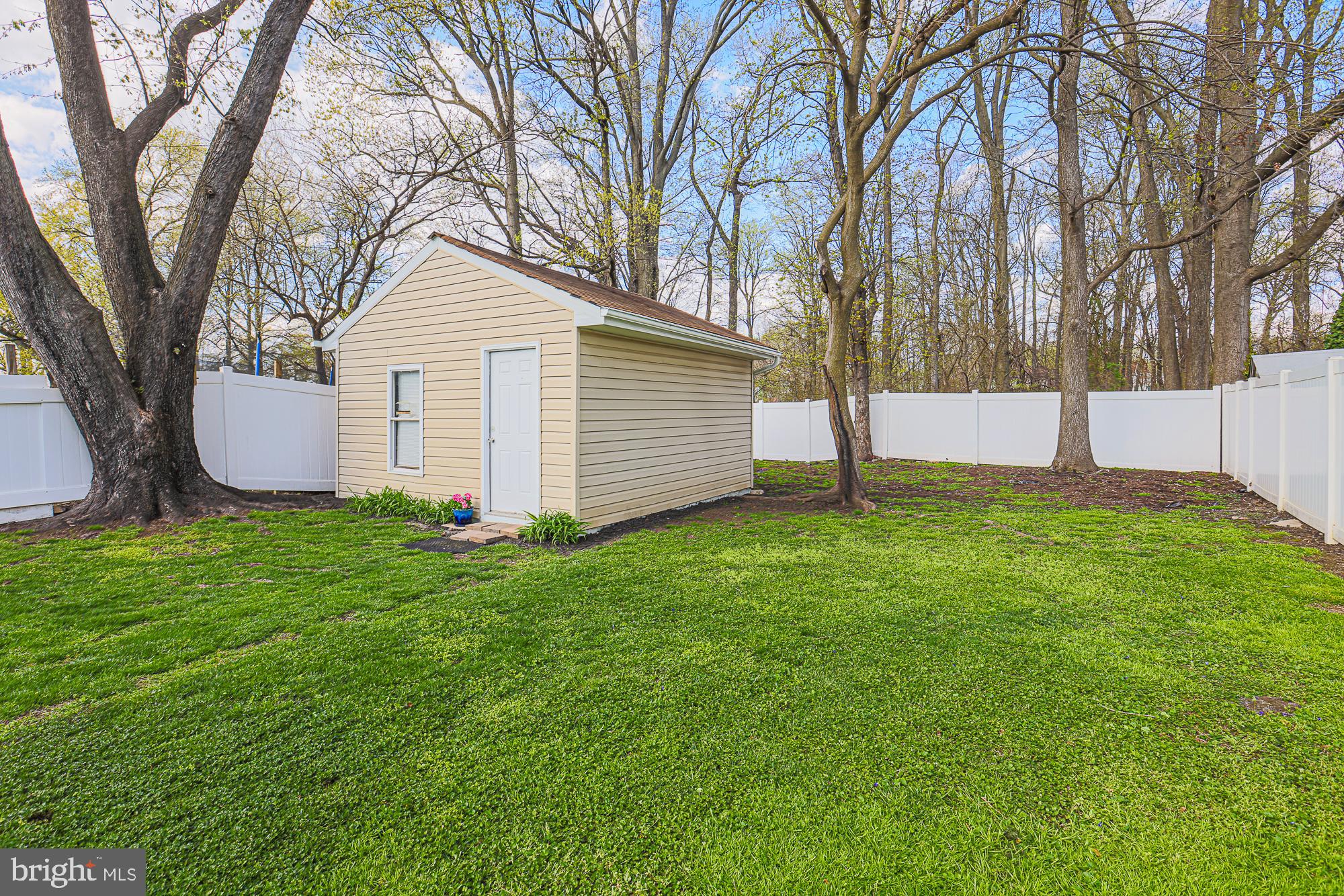 2519 Sycamore Avenue Baltimore, MD 21219 - Photo 27 of 30 a view of a house with backyard and tree