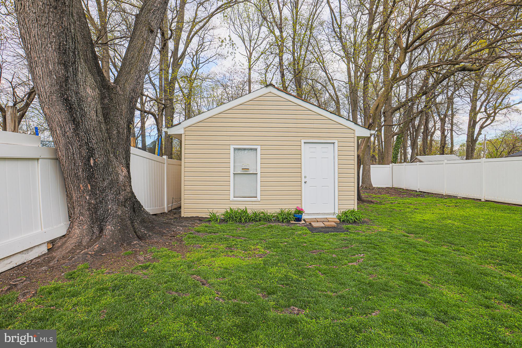 2519 Sycamore Avenue Baltimore, MD 21219 - Photo 28 of 30 a view of a house with a yard