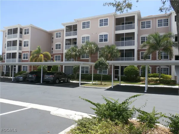 a view of multiple houses with a yard