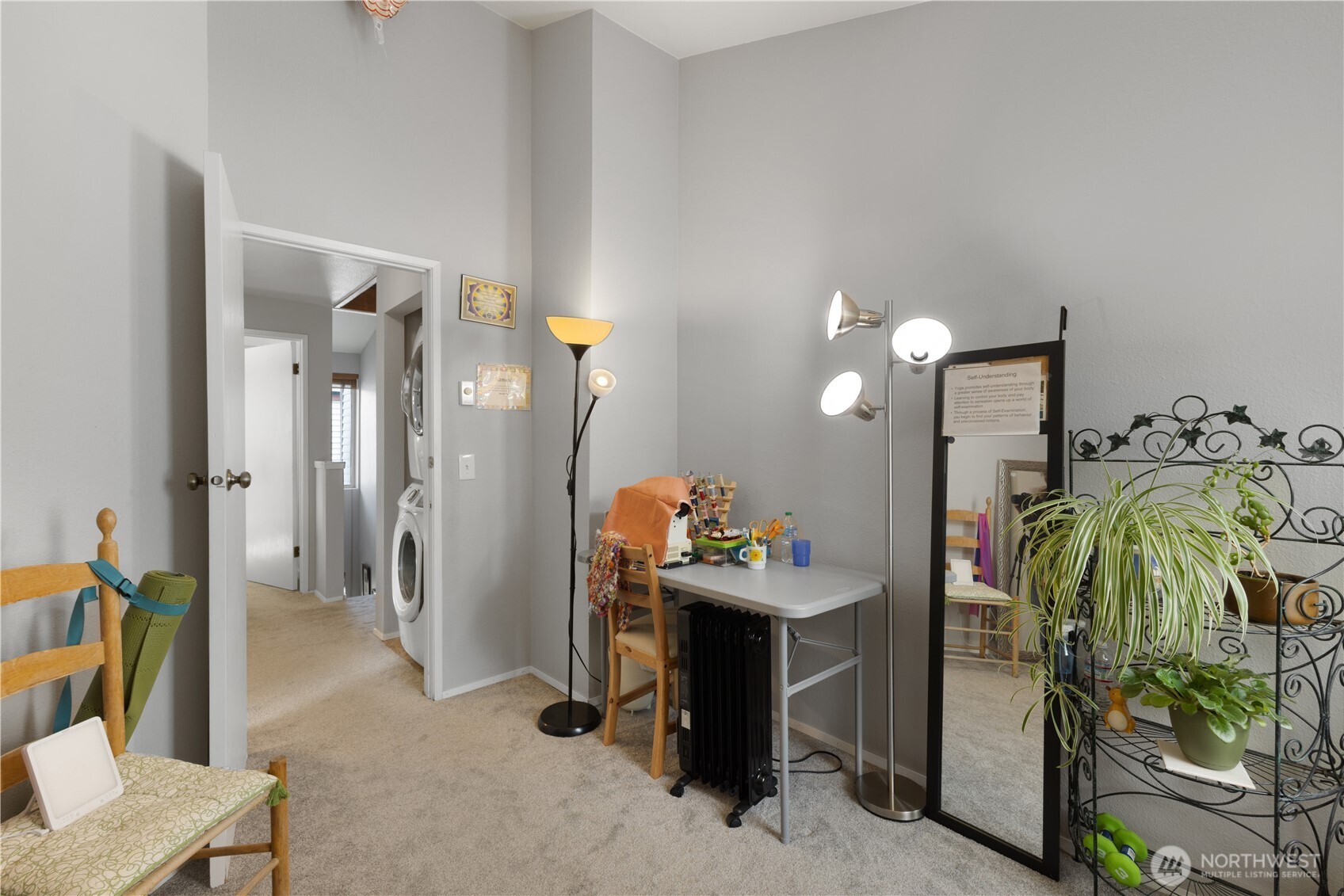 701 5th Avenue South, Unit C105 Kent, WA 98032 - Photo 16 of 31 a view of a livingroom with furniture and a hallway