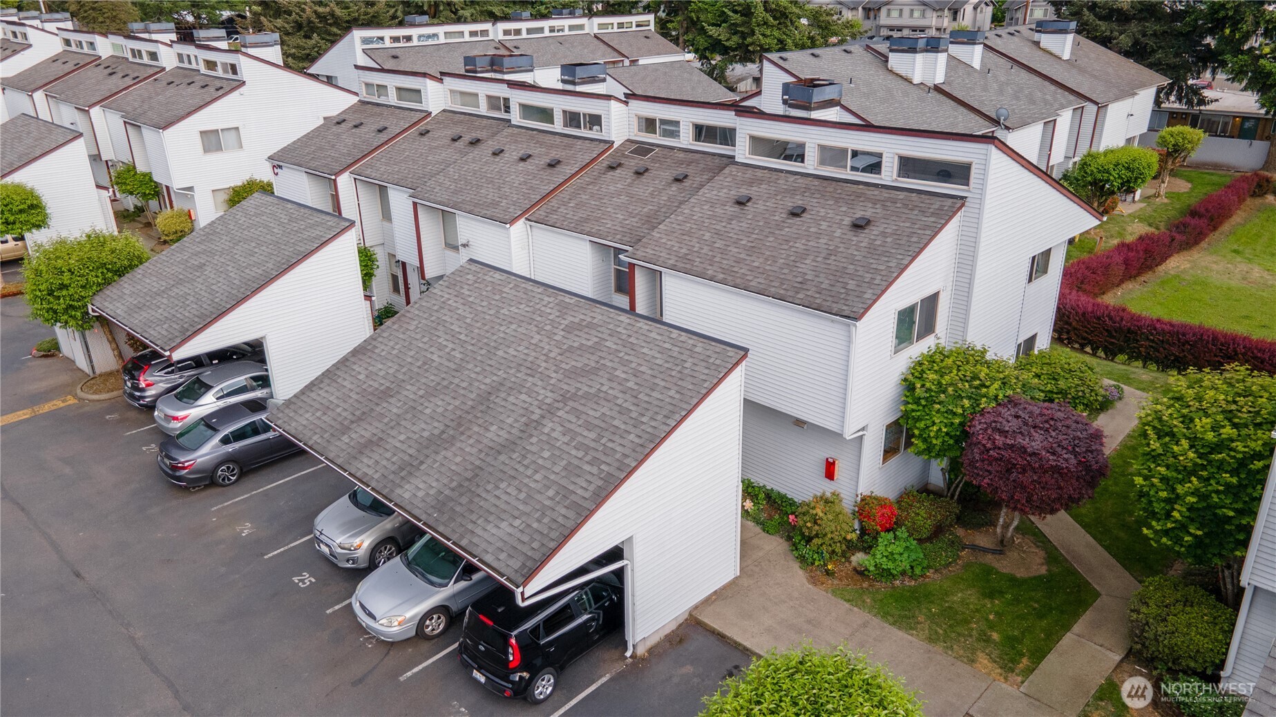 701 5th Avenue South, Unit C105 Kent, WA 98032 - Photo 2 of 31 an aerial view of a house with swimming pool and patio