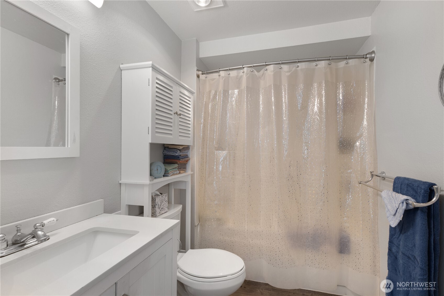 701 5th Avenue South, Unit C105 Kent, WA 98032 - Photo 21 of 31 a bathroom with a sink a toilet and shower