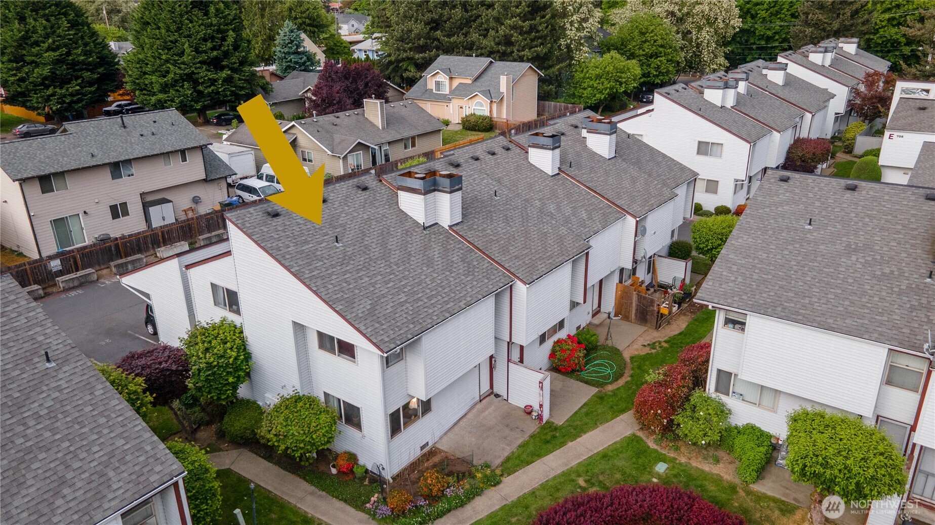 701 5th Avenue South, Unit C105 Kent, WA 98032 - Photo 3 of 31 an aerial view of a house with swimming pool