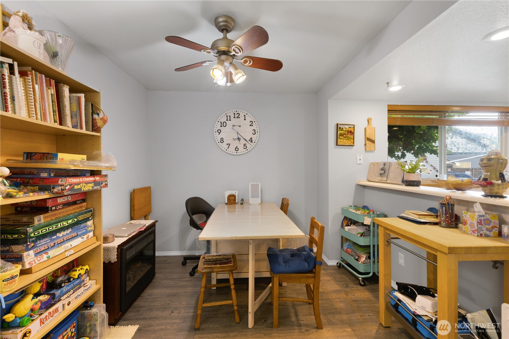 701 5th Avenue South, Unit C105 Kent, WA 98032 - Photo 8 of 31 a view of a dining room with furniture and chandelier