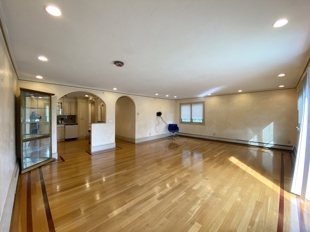 a view of a living room and dining room