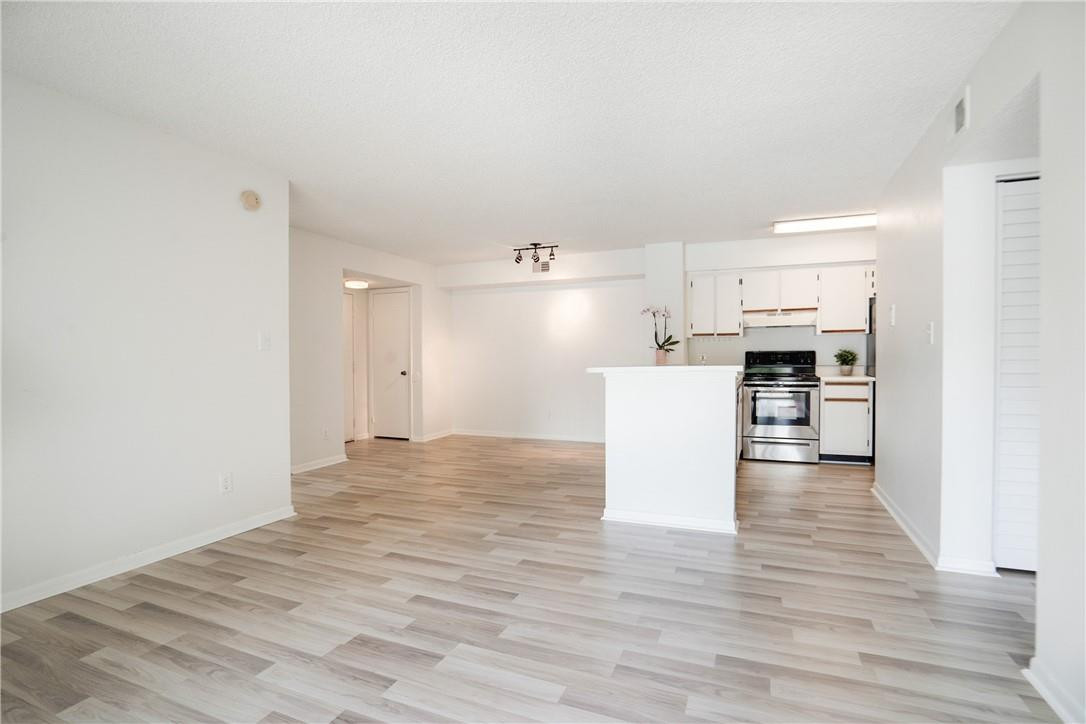 560 South Park Road, Unit 13 Hollywood, FL 33021 - Photo 5 of 17 LIVING ROOM, DINING AREA OPEN TO KITCHEN