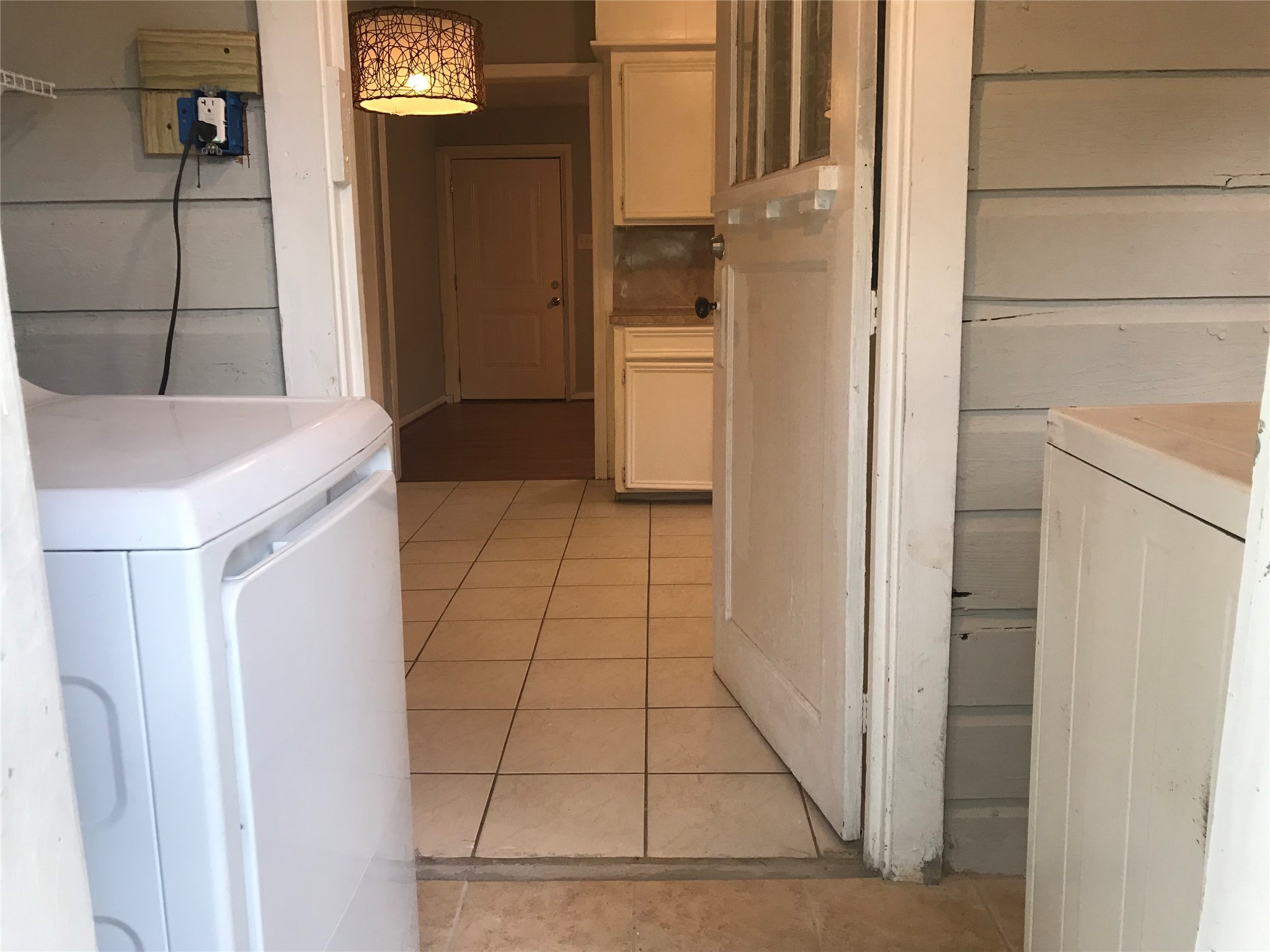 215 East 25th Street Houston, TX 77008 - Photo 9 of 18 a kitchen with a refrigerator and cabinets