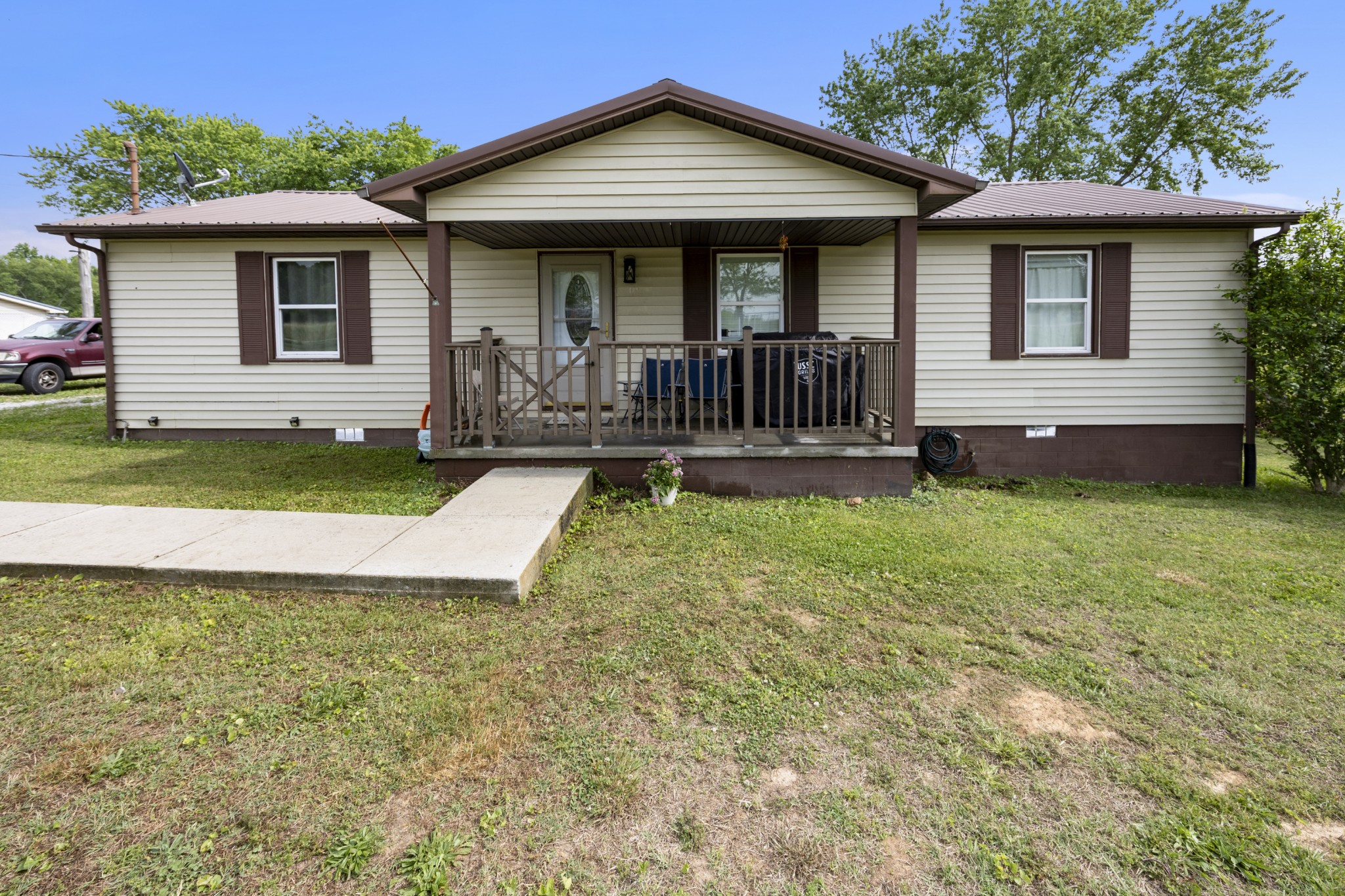 421 Shady Grove Road Flintville, TN 37335 - Photo 5 of 33 a view of a house with a yard and a garden