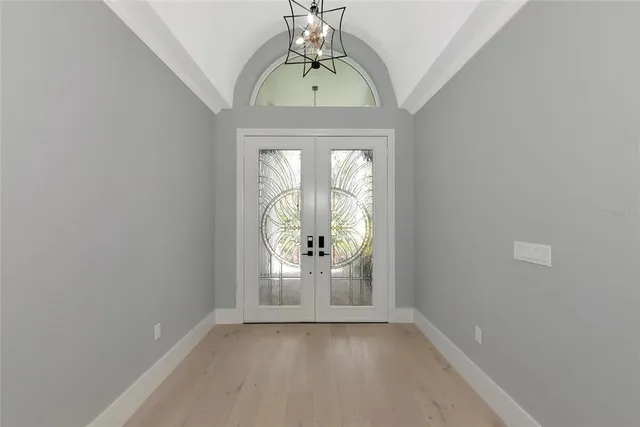 a kitchen with a sink and large window