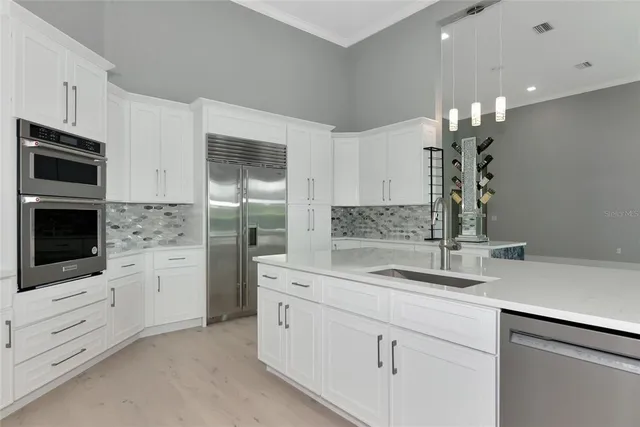 a white toilet sitting next to a shower