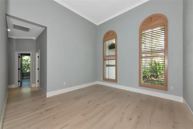a view of a house with swimming pool and a yard