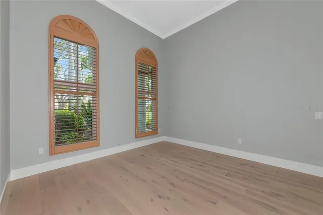a view of a playground with basketball court