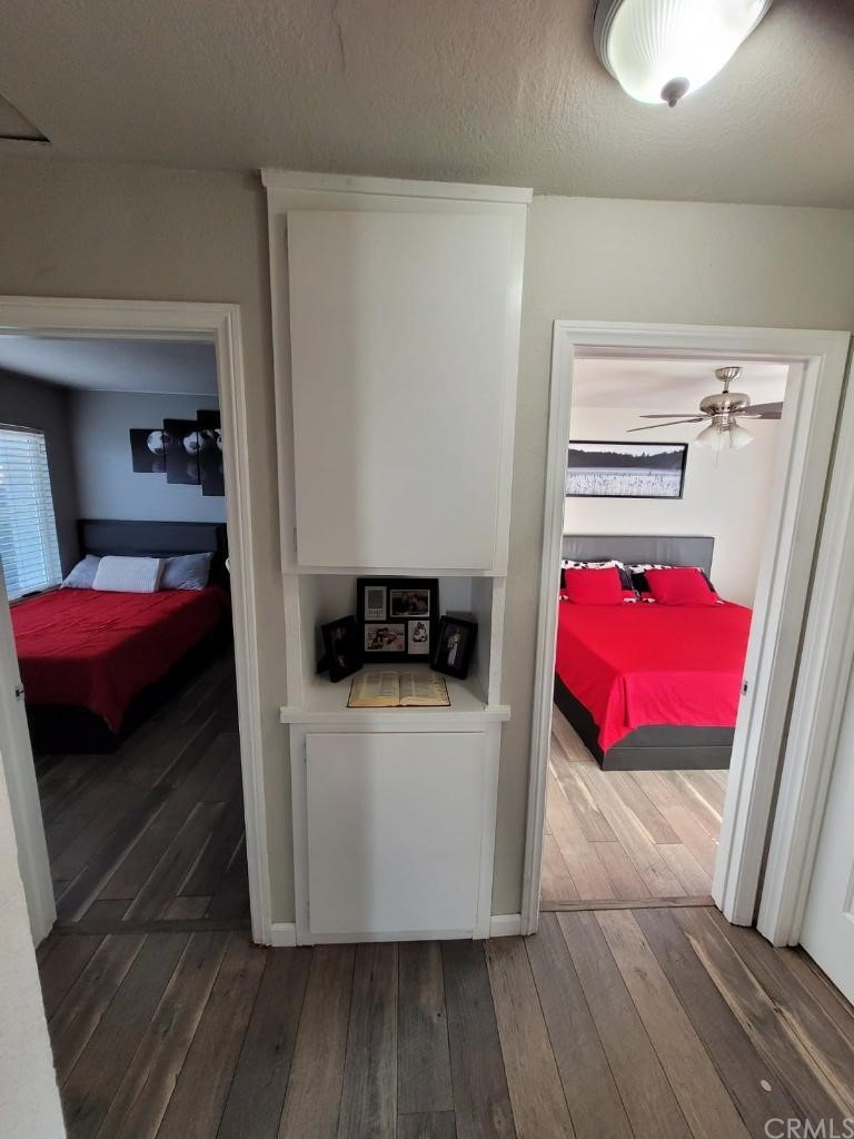 42901 Alexo Drive Lancaster, CA 93536 - Photo 12 of 20 a bedroom with a bed and a couch