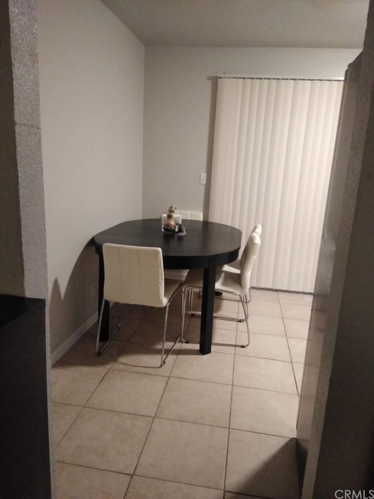 42901 Alexo Drive Lancaster, CA 93536 - Photo 17 of 20 a view of a workspace with furniture and window