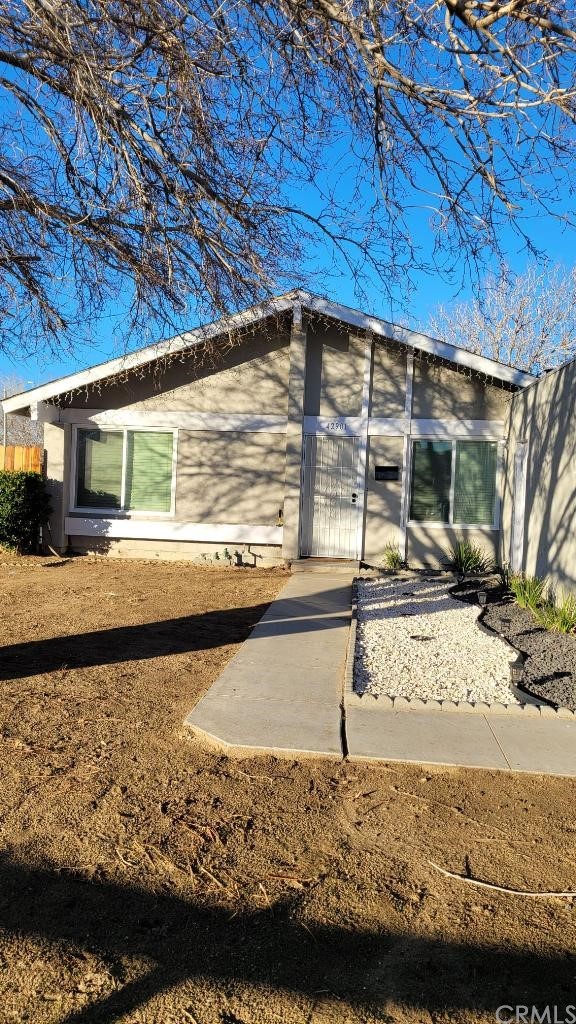 42901 Alexo Drive Lancaster, CA 93536 - Photo 2 of 20 a view of a backyard with a ocean view