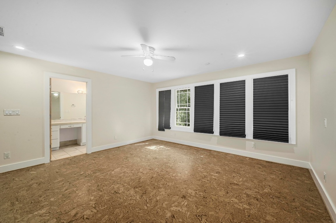 2204 Spring Creek Drive Austin, TX 78704 - Photo 16 of 34 a view of an empty room with a window