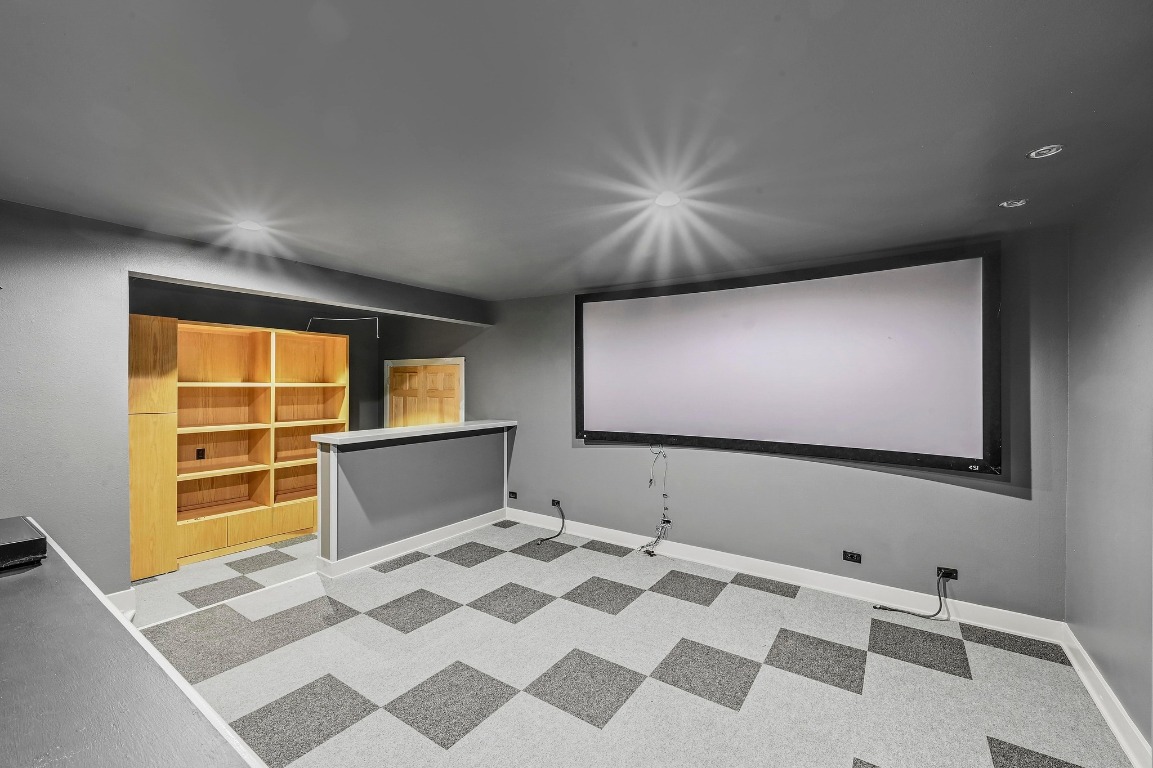 2204 Spring Creek Drive Austin, TX 78704 - Photo 31 of 34 a bedroom with a bed and a flat screen tv