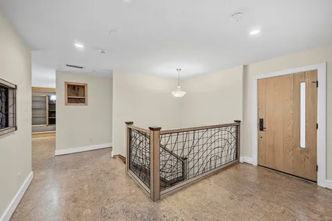 a view of a hallway with entryway