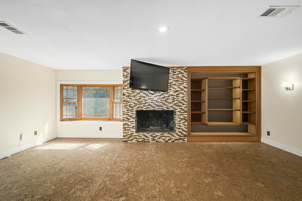 2204 Spring Creek Drive Austin, TX 78704 - Photo 6 of 34 a view of a livingroom with a fireplace and window