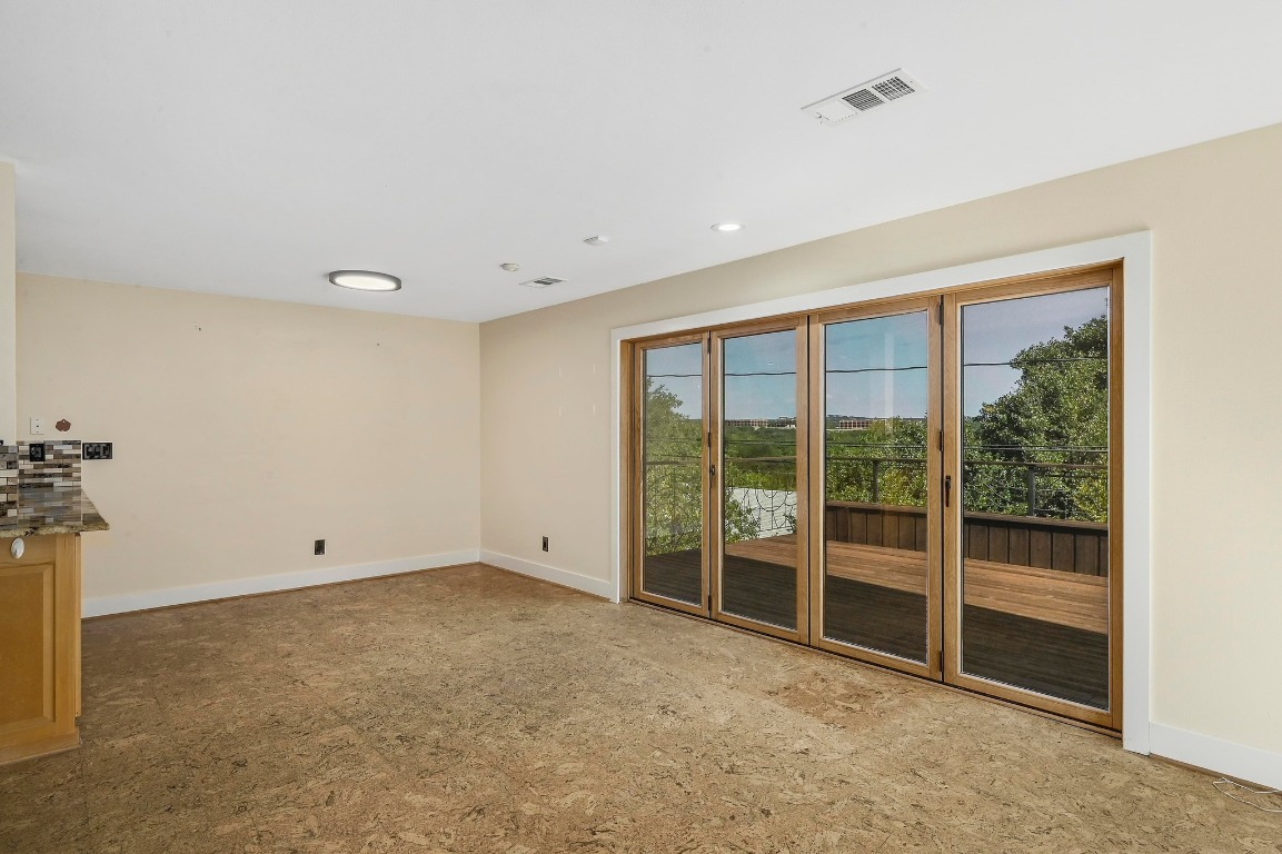 2204 Spring Creek Drive Austin, TX 78704 - Photo 7 of 34 a view of an empty room with a window