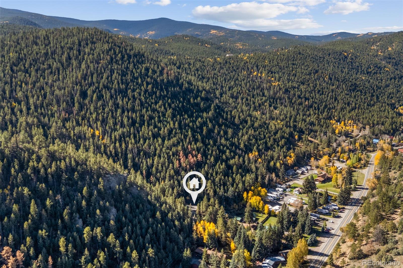 76 Wheel Haven Road Idaho Springs, CO 80452 - Photo 47 of 50 a view of city and mountain