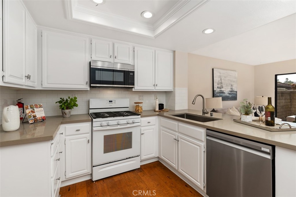 25721 Shell Drive Dana Point, CA 92629 - Photo 11 of 41 a kitchen with sink cabinets and stainless steel appliances