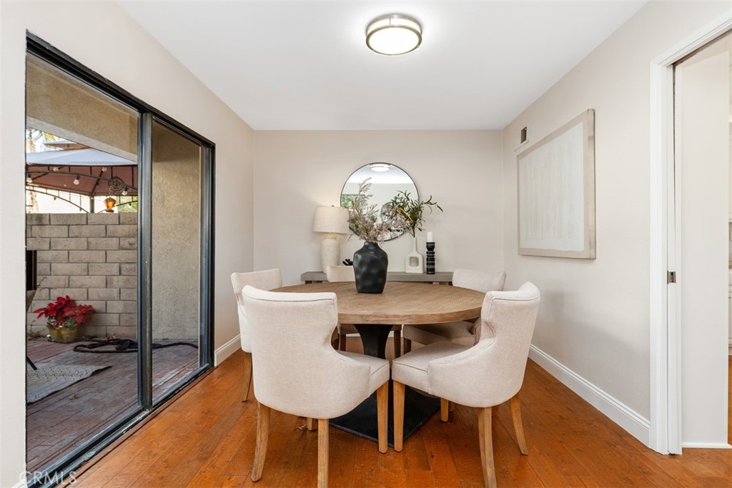 25721 Shell Drive Dana Point, CA 92629 - Photo 16 of 41 a view of a dining room with furniture and wooden floor