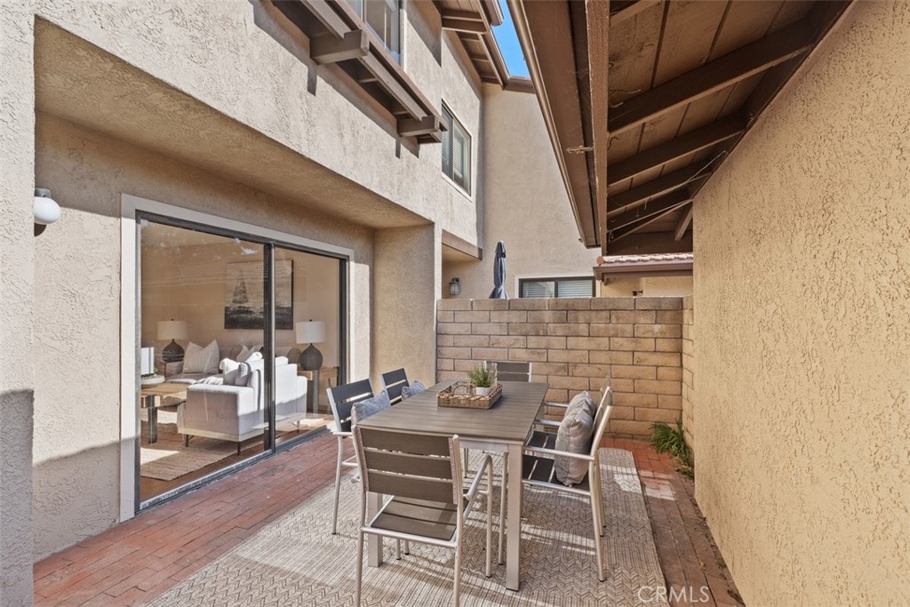 25721 Shell Drive Dana Point, CA 92629 - Photo 27 of 41 a view of a dining room with furniture and wooden floor