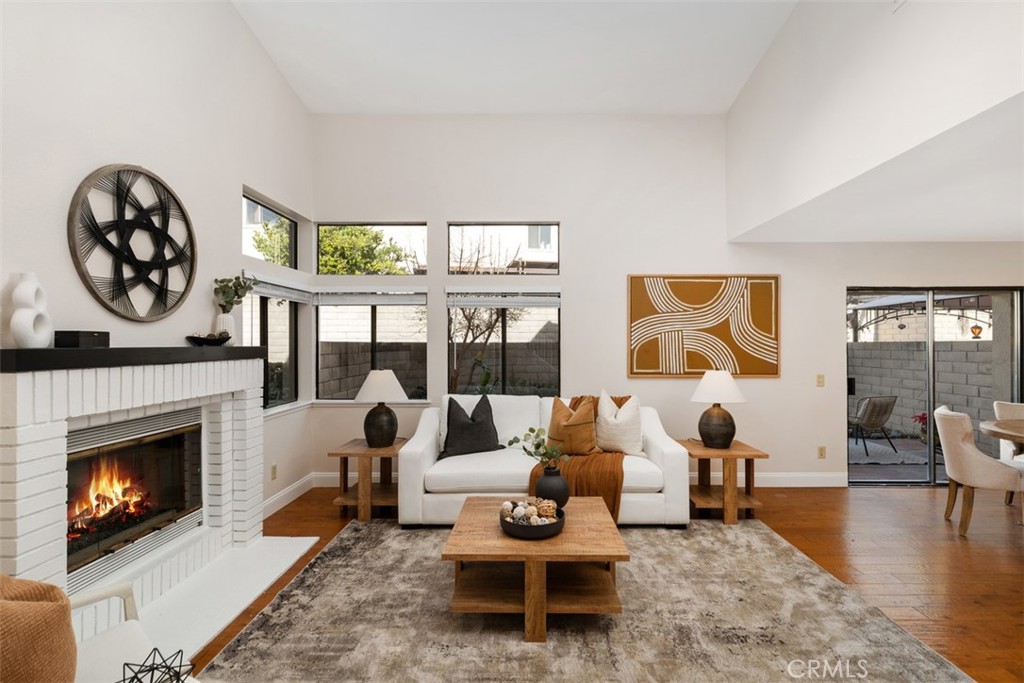 25721 Shell Drive Dana Point, CA 92629 - Photo 3 of 41 a living room with furniture a window and a fireplace