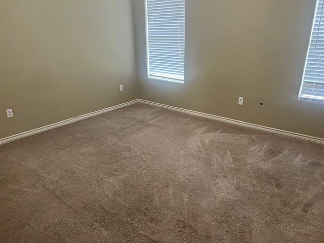 1904 Kelly Lane Kingsville, TX 78363 - Photo 15 of 21 an empty room with windows