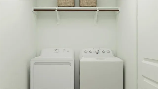 a utility room with dryer and washer