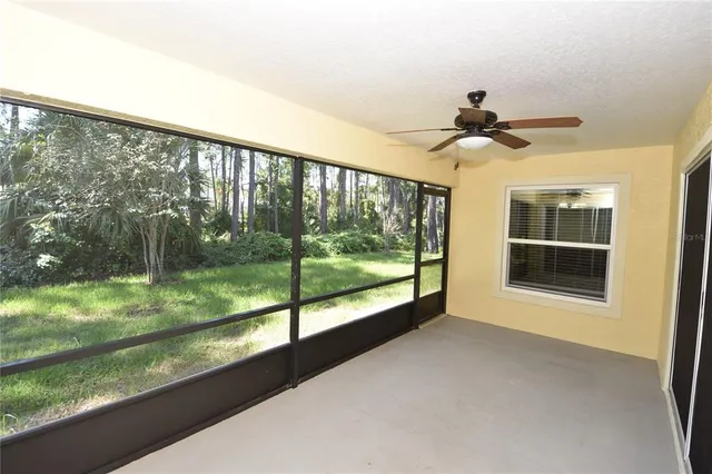 a view of a yard from a balcony