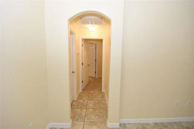 a view of a bathroom with a sink and a mirror