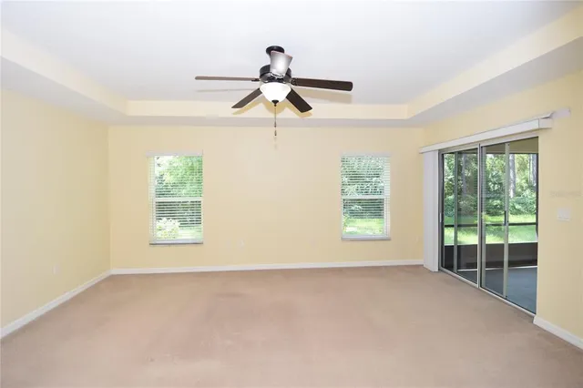 a view of a big room with carpet