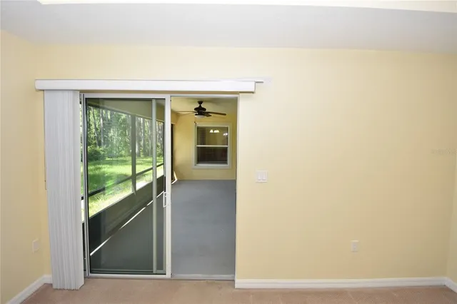 a view of hallway with living room