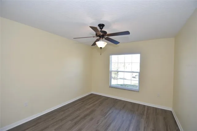 a view of a big room with wooden floor