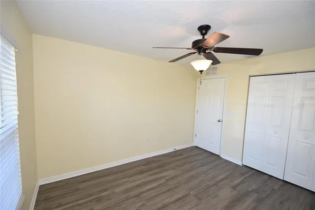 a view of a bathroom from a hallway